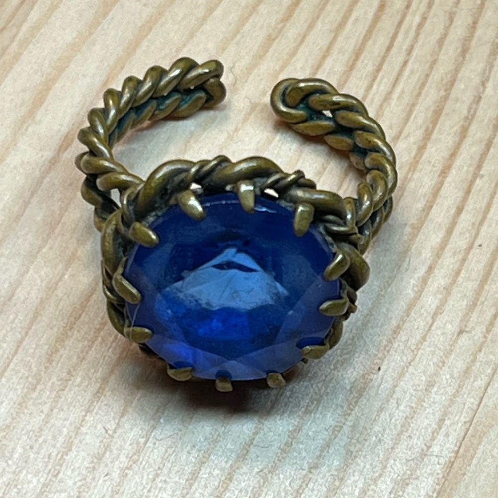 Vintage brass ring blue glass prong set